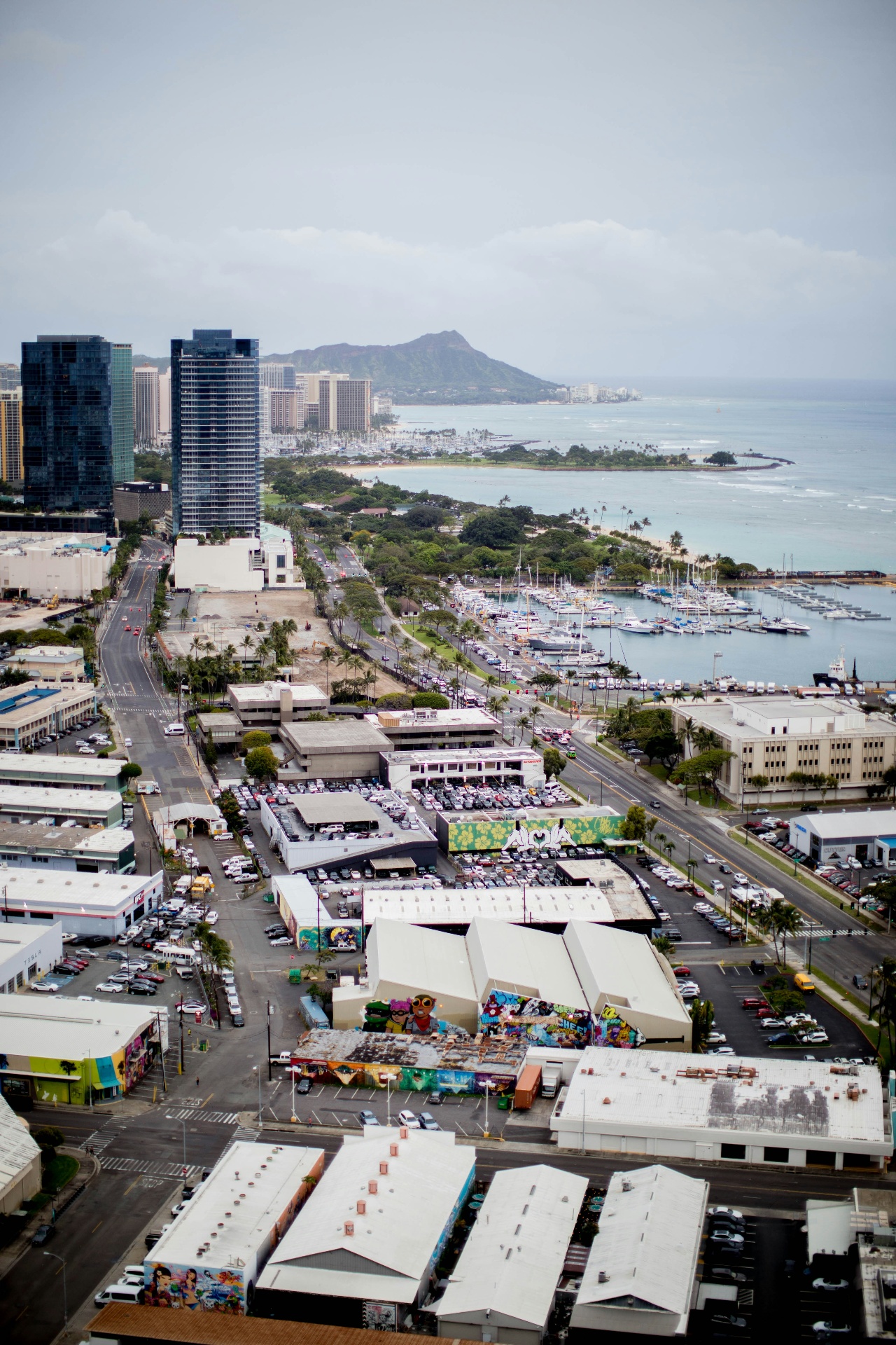 Aerial view of Honolulu harbor and Diamond Head where imported kei trucks arrive at Pier 31/32