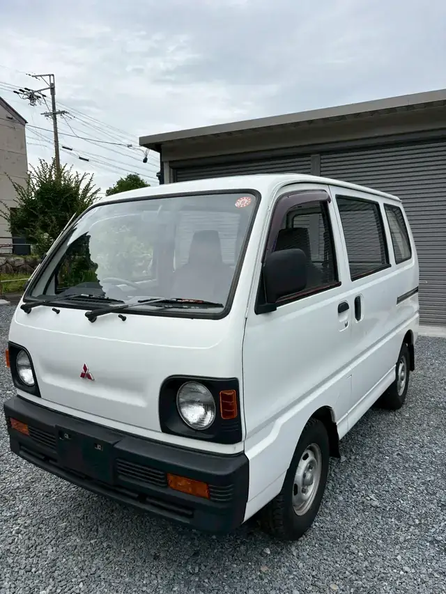 White 1992 Mitsubishi Minicab Kei van for sale, right-hand drive, front three-quarter view