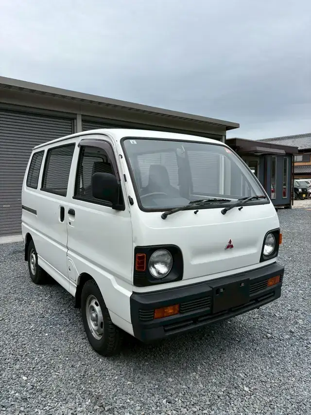 White 1992 Mitsubishi Minicab Kei van for sale, front three-quarter view, right-hand drive